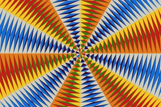 Radiating pattern of triangles arranged in a large quadrilateral, with pattern of blue, white, orange, green, red and yellow.