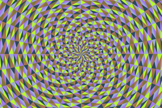 Radiating pattern of triangles arranged in a large quadrilateral, with pattern of lime green, dark green, light brown and lavendar. The pattern is offset creating a spiral.